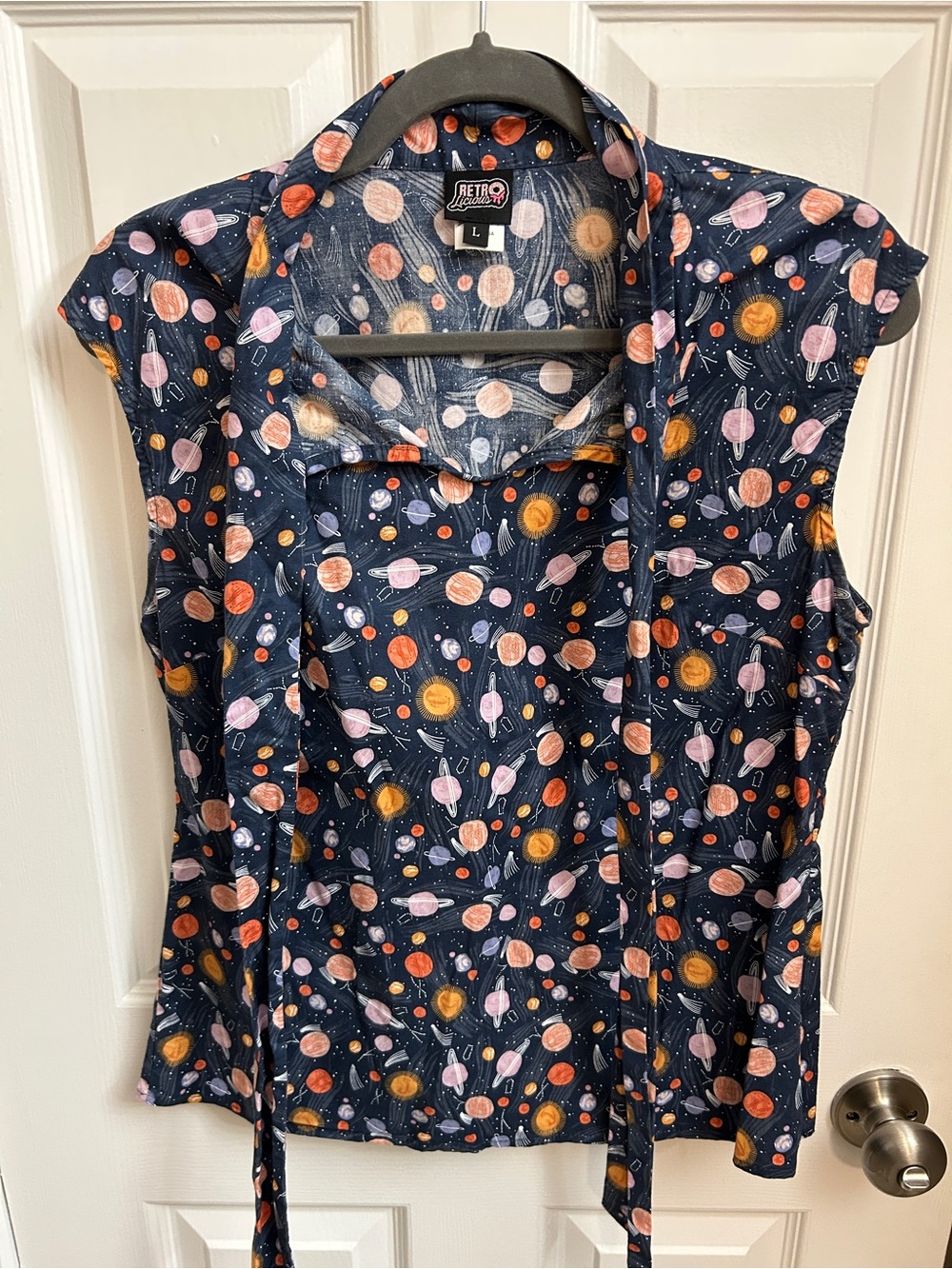 Retrolicious Navy Planet-Print Sleeveless Tie-Neck Top